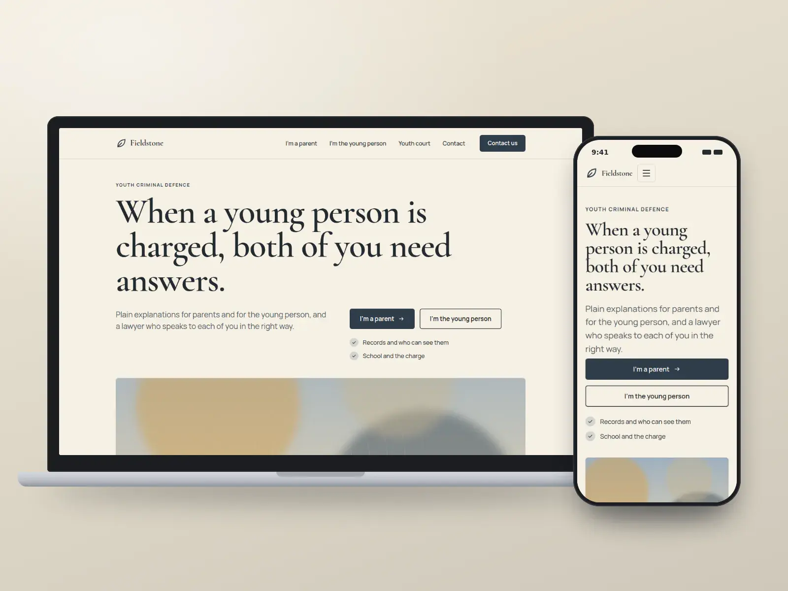 Fieldstone Youth Defence, a slate and brass on parchment editorial youth defence website with a large serif headline above a wide abstract slate and brass illustration, on a laptop and a phone.